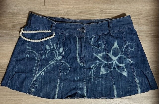 Denim skirt with floral bleach art